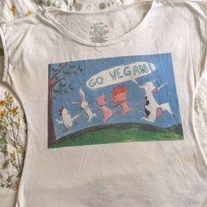 Custom-made tee shirt. Go vegan text and image.